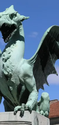 This phone live wallpaper depicts a stunning green dragon statue in art nouveau style