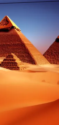 Get lost in a stunning digital art depiction of three Kemetic-inspired pyramids rising from the golden sand desert