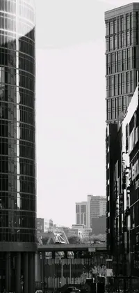 This phone wallpaper features a chic black and white cityscape photograph