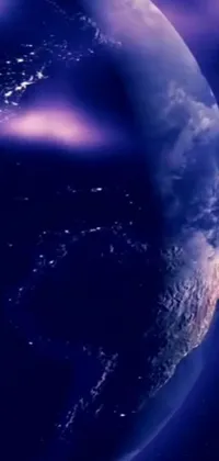 This stunning live wallpaper showcases a view of the earth from space at night, complete with a hologram, a giant sentinel that has crashed on earth, and an animation that offers a still screencap of the awe-inspiring scene