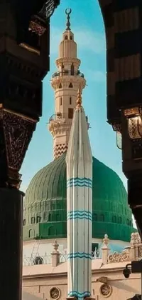 This stunning live wallpaper features a grand building with a striking green dome set against a clear blue sky