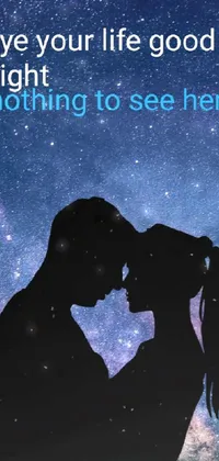 This phone live wallpaper features a romantic couple kissing in front of a mesmerizing night sky
