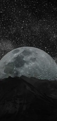 This live wallpaper showcases a striking black and white photo of a full moon, set against a stunning digital art view of the cosmos