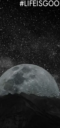 This live wallpaper for your phone showcases a stunning black and white photograph of a full moon