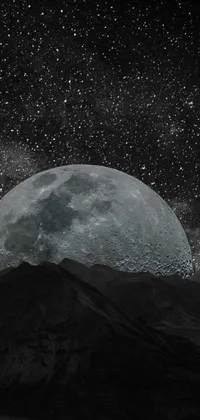 This stunning live wallpaper features a black and white photo of a full moon set against a digital art background with a Tumblr aesthetic