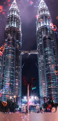 Enjoy a stunning 4K vertical live wallpaper of a traffic light situated on the side of a jungle road featuring the iconic Twin Towers of Kuala Lumpur in the distance