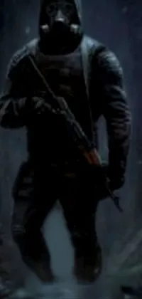 This phone live wallpaper features a gothic-inspired poster of a man holding a gun, set against a dark, mysterious background