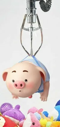 This phone live wallpaper showcases a playful toy pig hovering above a colorful pile of toys