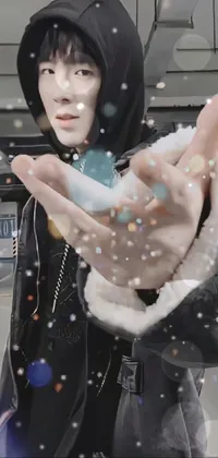 Looking for an intense phone live wallpaper filled with mystery and intrigue? Look no further than this incredible design! With a man firmly gripping an object in his hand, framed by the hime cut and set against a backdrop of twinkling stars and an oversaturated, ice-like atmosphere, you won't be able to look away
