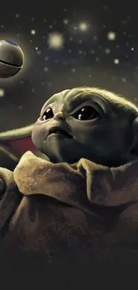 This lively phone wallpaper showcases a lovable Baby Yoda playing with a basketball