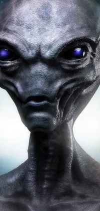 Transform the look of your phone with this amazing live wallpaper! Featuring a captivating close-up of a grey alien with piercing blue eyes, this digital art creation is sure to grab attention