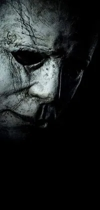 Get in the spooky spirit with this live phone wallpaper featuring a striking close-up of a carved Michael Myers mask
