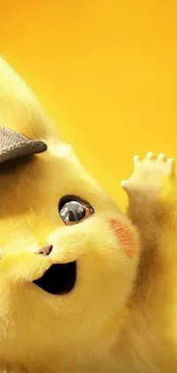 This phone wallpaper showcases a bright and lively close-up of the iconic Pikachu character from the popular Pokemon franchise