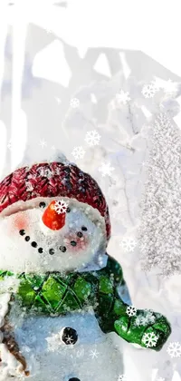 Enjoy the winter wonderland on your phone screen with this live wallpaper