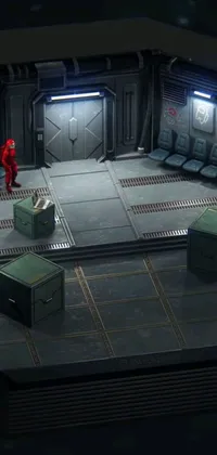 This live phone wallpaper showcases a man in a red suit in a space station surrounded by crates and parts