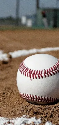 This live wallpaper features a baseball resting on a vibrant green baseball field