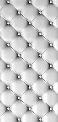 Get a stylish and modern black and white live wallpaper for your phone with this sleek upholstered leather design