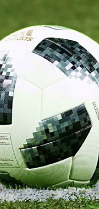 This dynamic live wallpaper features a soccer ball bouncing around on a field, enhanced with confetti for a festive touch