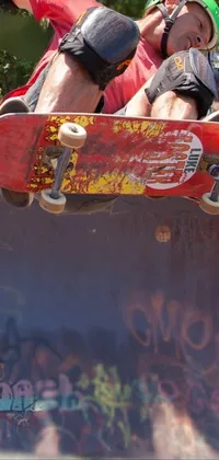 This phone live wallpaper features an animated scene of a skateboarder performing a daring and exhilarating leap through the air