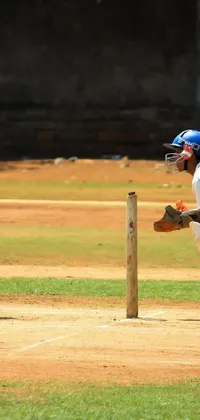 Get immersed in the exciting world of cricket with this live wallpaper capturing two men playing the game in Bangalore, India