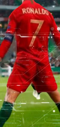 Looking for an exciting phone background? Check out this dynamic live wallpaper featuring a man kicking a soccer ball on a field surrounded by a cheering stadium