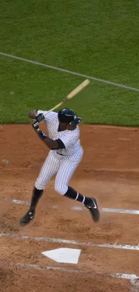This phone live wallpaper features a baseball player in pitch black skin, mid-swing on a field