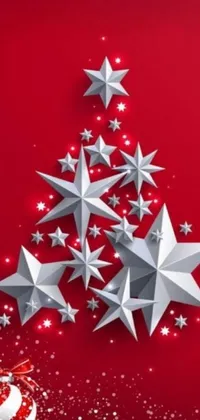 This Christmas-themed live wallpaper features a beautiful tree made up of stars against a red background