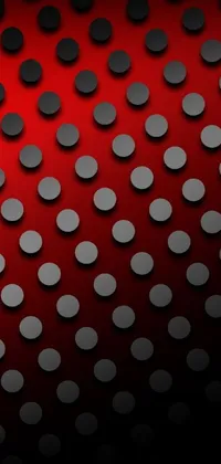 This live wallpaper features a bold black and white polka dot pattern set against a vibrant red background