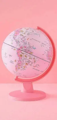 This stunning live wallpaper features a pink globe with intricate, traditional Japanese patterns that rotate seamlessly on a beautiful gradient pink background adorned with a variety of floral designs