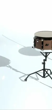 This live wallpaper for phones features a striking 3D render of a drum on a stand