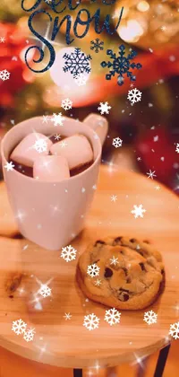 This live phone wallpaper showcases a realistic image of a steaming cup of hot chocolate and a yummy cookie on a wooden table, complemented by gentle snowflakes falling in the background