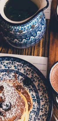 This phone live wallpaper is a cozy and rustic scene of a table filled with plates of delicious food and cups of warm drinks