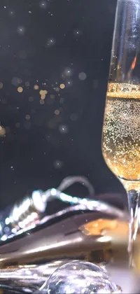 This lively phone live wallpaper showcases two champagne glasses and a bottle of bubbly, all set against a carnival background