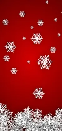 Bring the holiday spirit to your phone with this charming Christmas background! Designed with a stunning red and white color scheme and featuring delicate snowflakes, this live wallpaper is perfect for the most wonderful time of the year