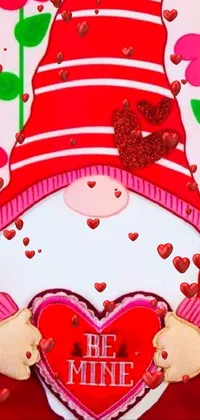 This phone live wallpaper is a delightful example of folk art, featuring a gnome holding a bright red heart