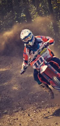 Experience the thrill of dirt biking with this exciting live wallpaper featuring a rider tearing up a dirt track