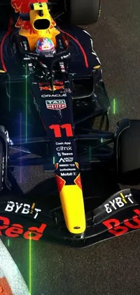 This stunning live wallpaper features a red bull racing car blazing along a thrilling racetrack