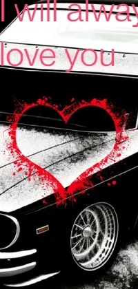 This live wallpaper for phones features an eye-catching black and white photo of a muscle car with a heart painted on its door