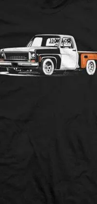 This live wallpaper features a unique black shirt design with a bold image of a truck in a lowbrow style by Eddie Mendoza
