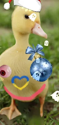 This phone live wallpaper showcases a festive duck adorned in a Santa hat and holding a Christmas ornament in its beak