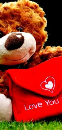Bring sweetness and warmth to your phone with the cutest live wallpaper - an adorable teddy bear holding a red envelope with a loving message
