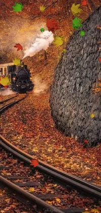 This phone live wallpaper depicts a train journey through a forested landscape in autumn