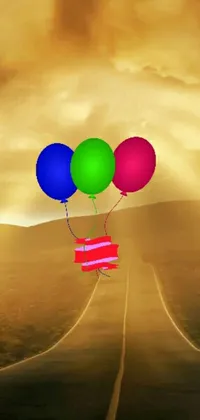 This enticing phone live wallpaper showcases a winding road adorned with an array of colorful balloons, creating a delightful and festive ambiance