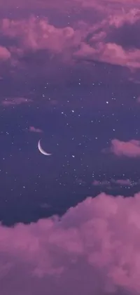 Introducing a beautiful live wallpaper for your phone - it features a dreamy crescent moon displayed against a backdrop of clouds