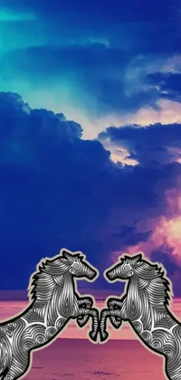This stunning phone live wallpaper features two zebras standing side by side on a beach, complemented by a cloudy background