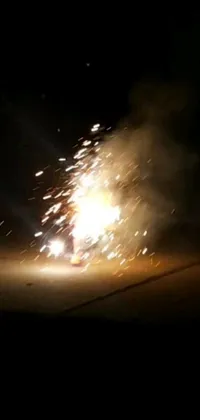 This mobile live wallpaper is an auto-destructive art display that depicts a firework exploding against a dark background