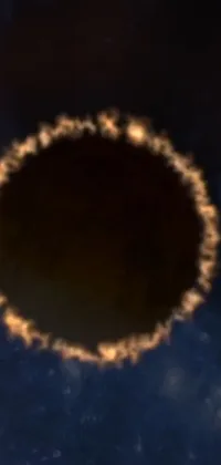 This phone live wallpaper features a digital rendering of a ring of fire in the sky, perfect for adding drama and intensity to your home screen