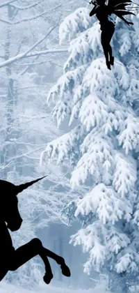 This live wallpaper for your phone features an enchanting silhouette of a horse and rider in a winter landscape