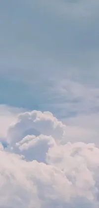 This live wallpaper showcases a stunning digital artwork of a large jetliner flying through a cloud-filled sky