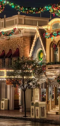 This phone live wallpaper depicts a stunning street filled with Christmas lights and enchanting Victorian buildings